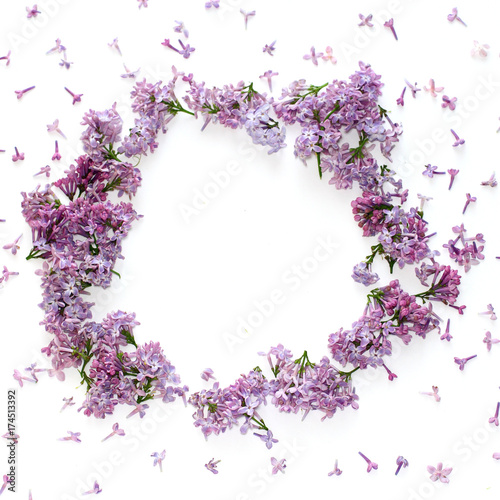 floral border of fresh lilac flowers on white, flat lay, top view. square