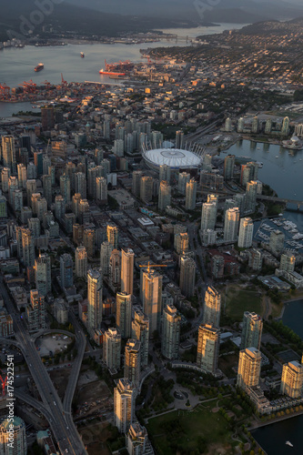 Aerial view of the Downtown City Landscape during a colorful and vibrant sunset. Taken in Vancouver  British Columbia  Canada.