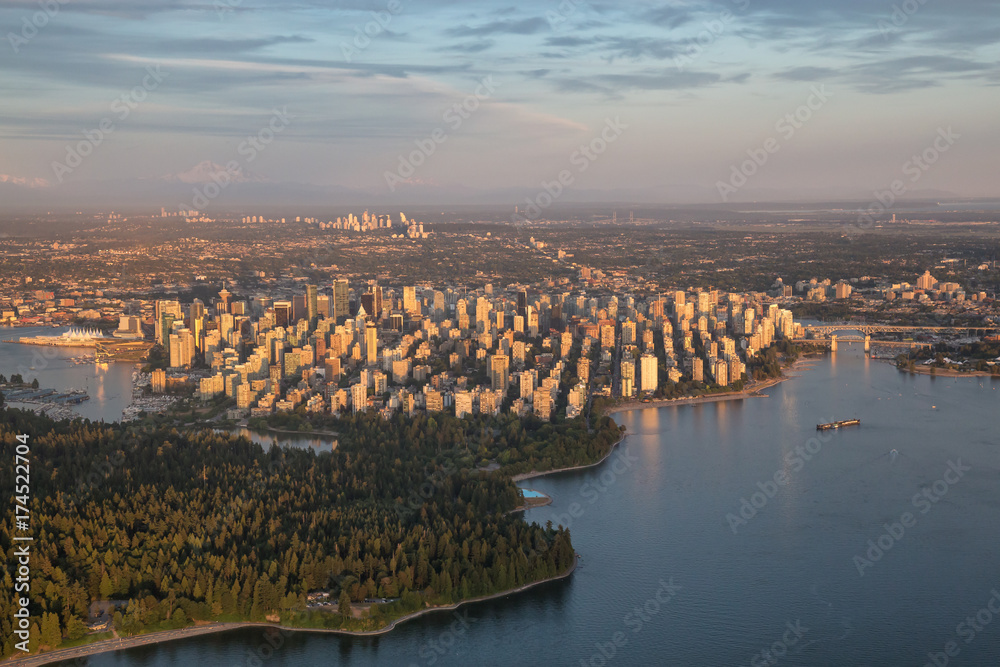 Fototapeta premium Aerial view of the Downtown City Landscape during a colorful and vibrant sunset. Taken in Vancouver, British Columbia, Canada.