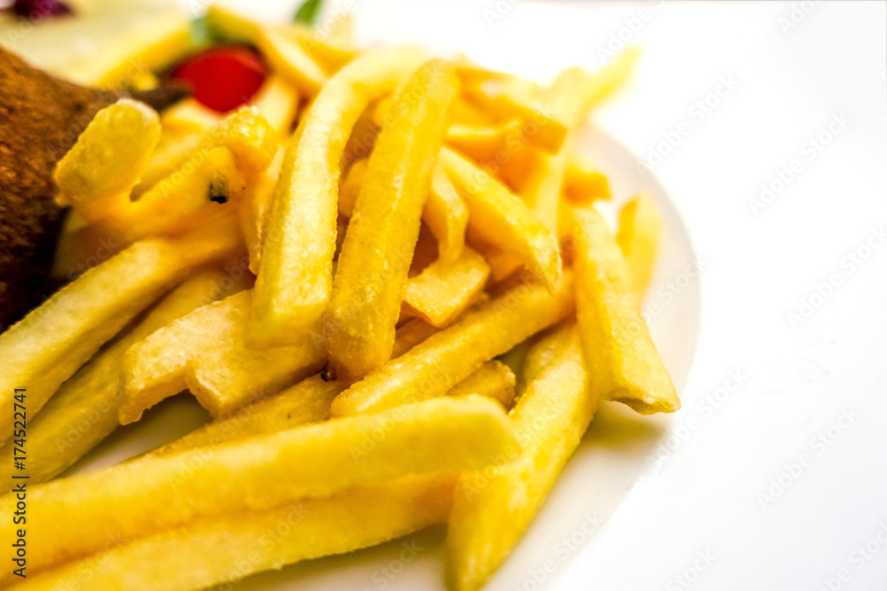Golden French fries potatoes ready to be eaten Golden French fries potatoes ready to be eaten
