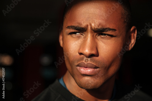 Close up portrait of a handsome young african man