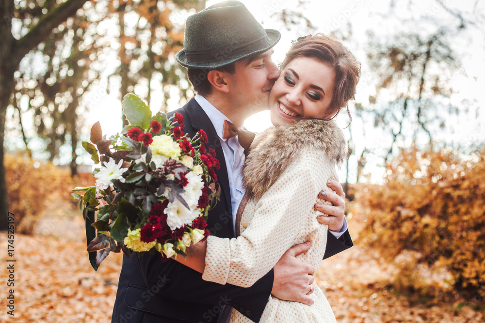 Fototapeta premium couple in love celebrating wedding in autumn