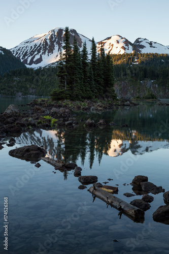 Beautiful morning view on a famous hiking spot, Garibaldi Lake, during a vibrant summer sunrise. Located near Squamish and Whistler, North of Vancouver, BC, Canada.
 photo