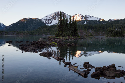 Beautiful morning view on a famous hiking spot, Garibaldi Lake, during a vibrant summer sunrise. Located near Squamish and Whistler, North of Vancouver, BC, Canada.
 photo