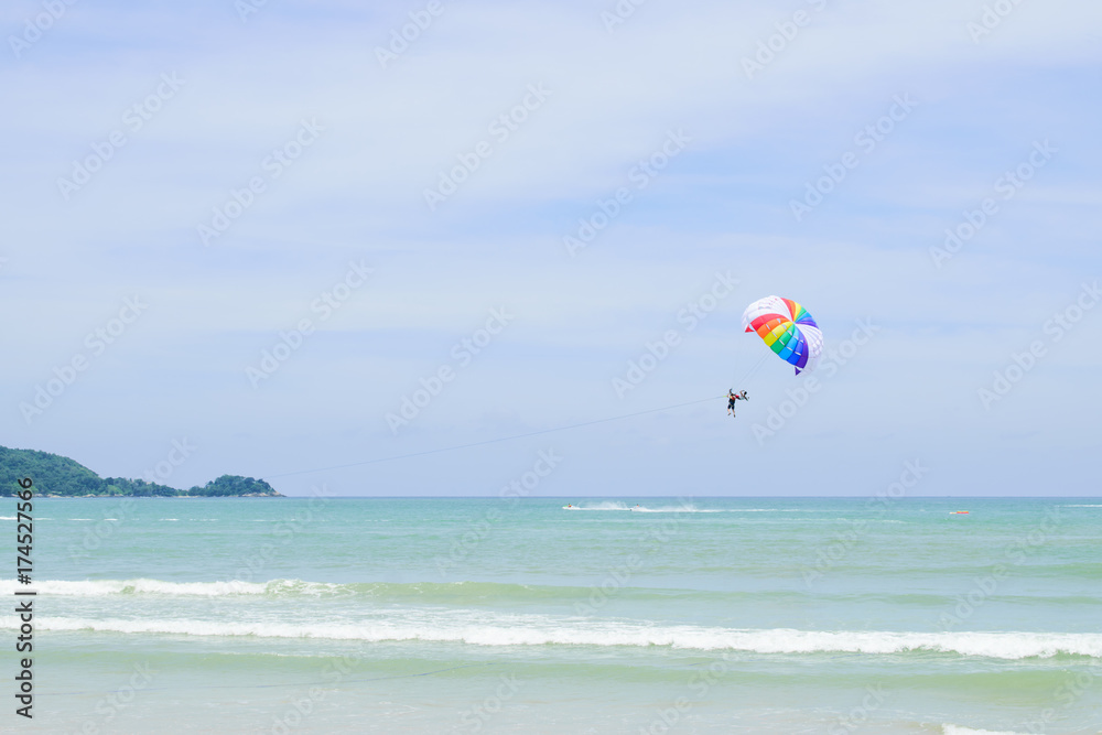 The sky parachute has a blue backdrop background. The sky parachute has a blue backdrop background.