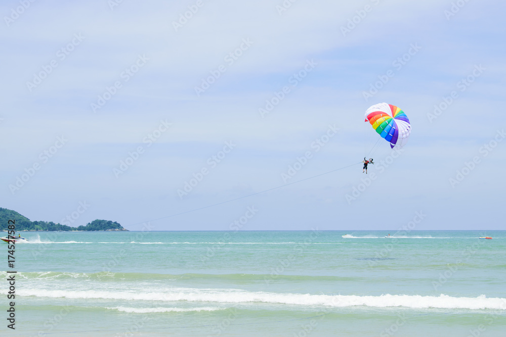 Parachutes in the sky float over the Andaman Sea. Parachutes in the sky float over the Andaman Sea.