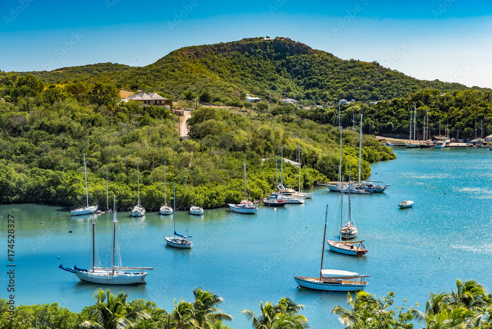 Tropical bay on Antigua with small boats