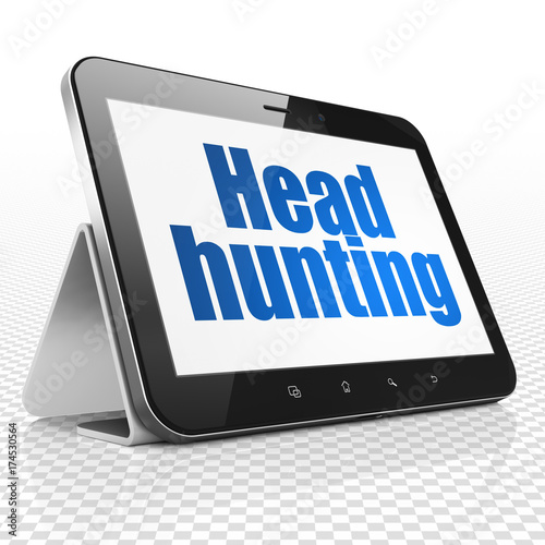 Finance concept: Tablet Computer with Head Hunting on display