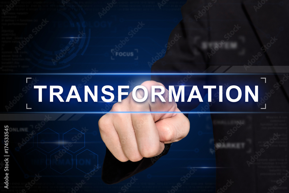 business hand pushing transformation button on virtual screen