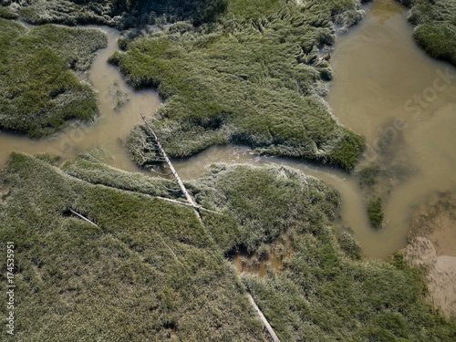 Aerial view from above of a swampy river in Squamish, British Columbia, Canada.