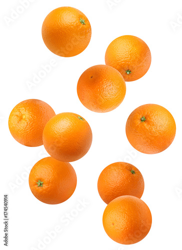 Falling oranges isolated on white background.