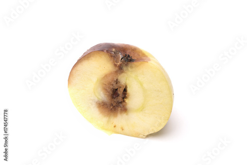 Rotten apple in a cut isolated on a white background