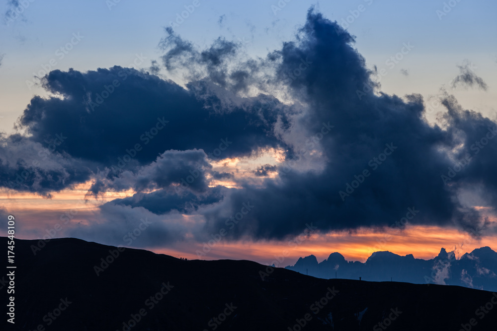 Fototapeta premium Sunset dolomites skyline and cloudy sky, Veneto, Italy