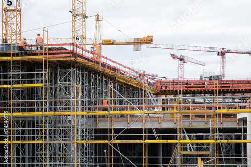 Cranes on construction site © cineberg