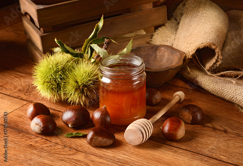 chestnuts honey in glass jar