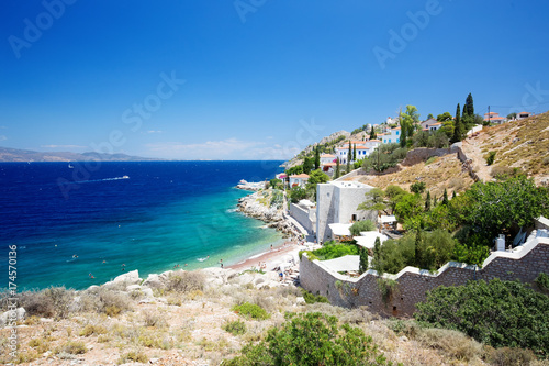 View from Hydra Island. Castello Hydra and Kamini beach. Blue sky