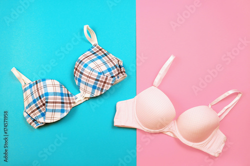 Bra on hanger on two tone background