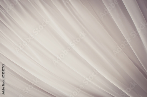 Soft tulle abstract fabric background. Toned image © kyrychukvitaliy