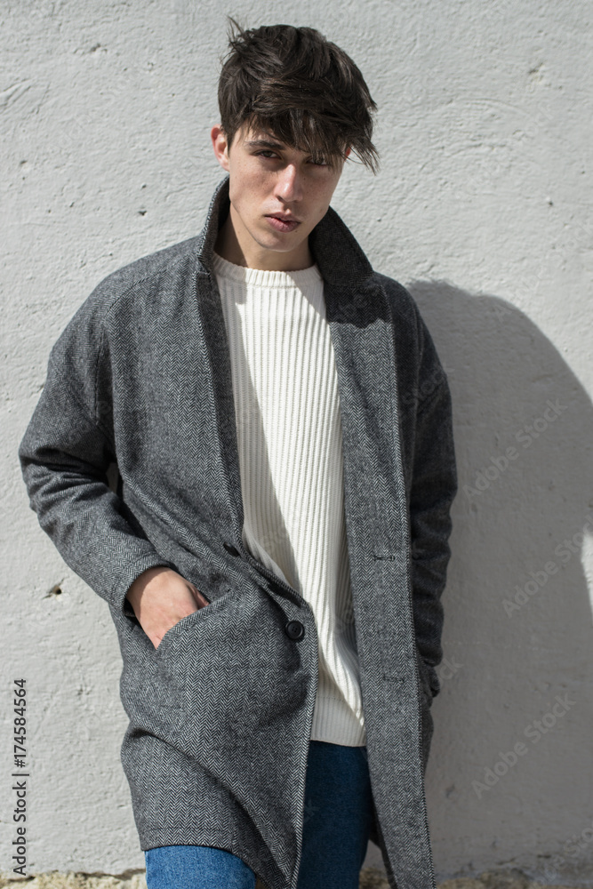 Man leaning on a wall Man leaning on a wall