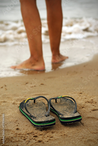  flip flops on the seashore