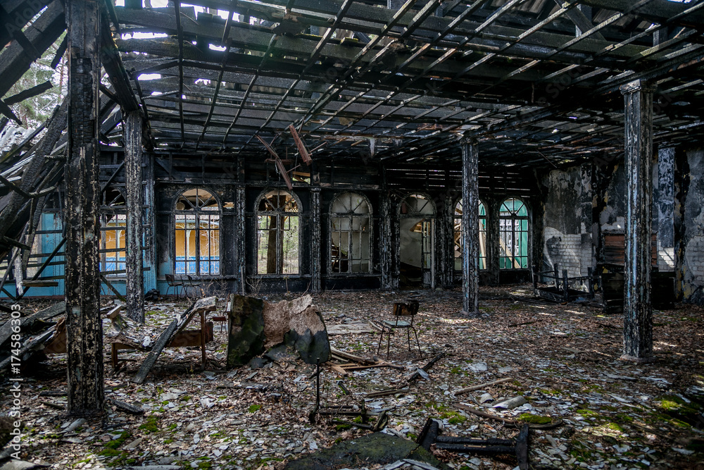 Burned-out ruins of mansion interior after fire Burned-out ruins of mansion interior after fire