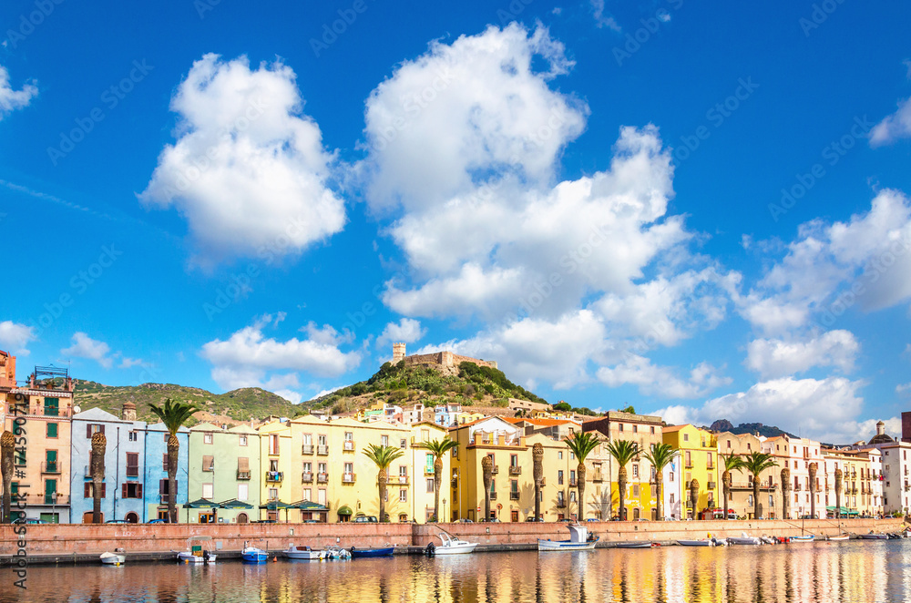 Colorful buildings beautiful Bosa on a background of blue sky, Sardinia