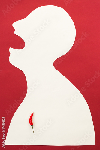 concept of human disease, suffering and stinging pain - abstract white male man isolated on red background shouted mouth from severe pain in heart or in the chest, burning pain such as spicy chili
