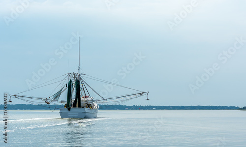 Shrimp Trawler Boat Heading to Sea in Savannah Georgia