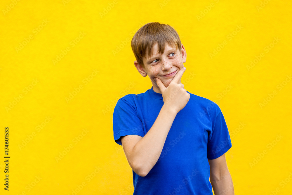 Young freckled boy conceived something bad.