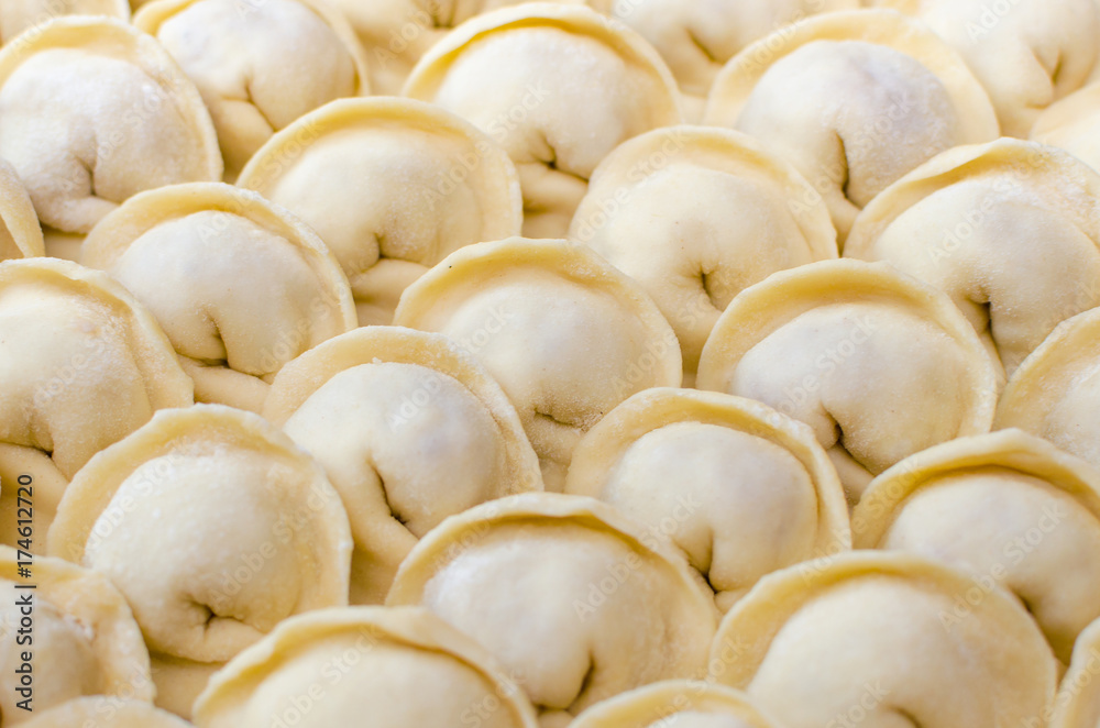 Fresh homemade raw dumplings background texture Fresh homemade raw dumplings background texture