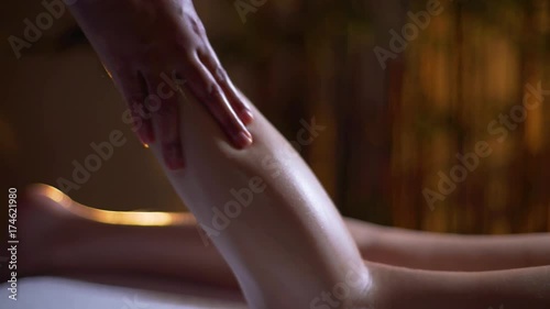 Wallpaper Mural massage of the female back. hands of the masseuse, foot massage Torontodigital.ca