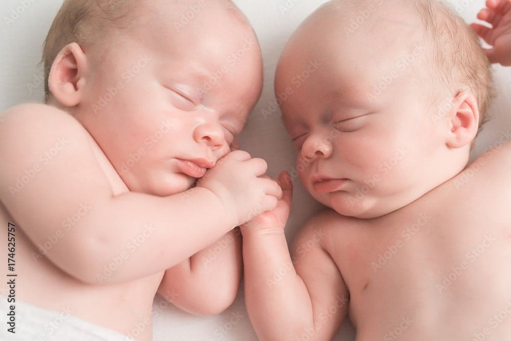 Newborn Twin Brothers Holding Hands Newborn Twin Brothers Holding Hands