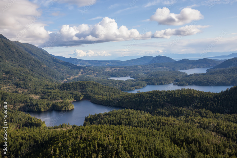 Klein Lake and Ruby Lake in Sunshine Coast, British Columbia, Canada, during a cloudy evening from an Aerial View. Klein Lake and Ruby Lake in Sunshine Coast, British Columbia, Canada, during a cloudy evening from an Aerial View.