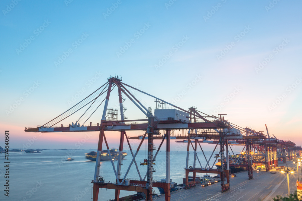 row of giant cranes at freight terminal,china.