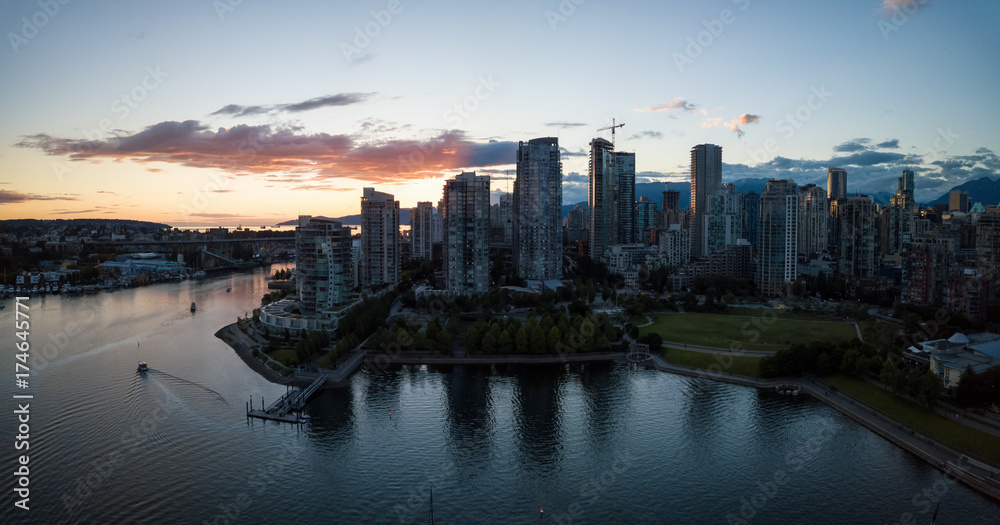 Naklejka premium Aerial Panorama of Downtown City at False Creek, Vancouver, British Columbia, Canada. Taken during a bright sunset.