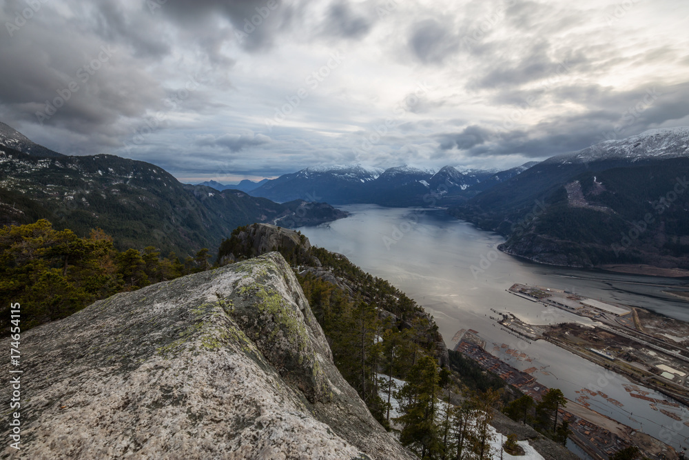 Beautiful View of Howe Sound from the top of the Chief Mountain Peak in Squamish, British Columbia, Canada.