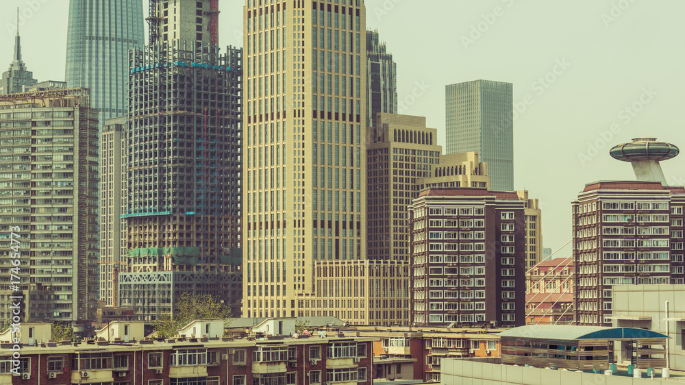 Obraz premium architectural complex against sky in downtown tianjin,china.