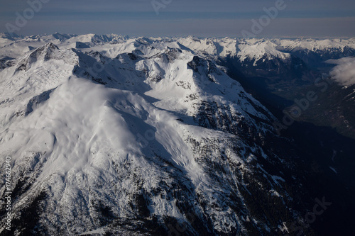 Aerial landscape view of the mountains. Taken far remote North West from Vancouver, British Columbia, Canada.