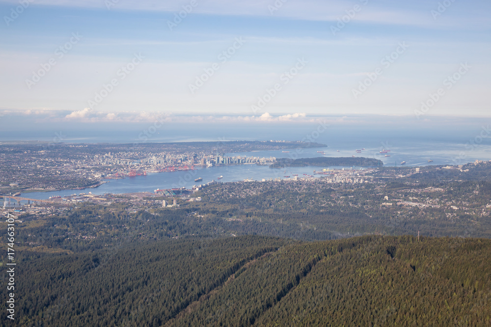 Vancouver City, British Columbia, Canada. Taken during a hazy morning from an aerial perspective. Vancouver City, British Columbia, Canada. Taken during a hazy morning from an aerial perspective.