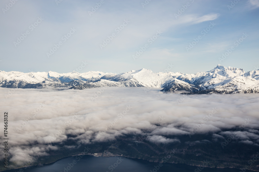 Cloud Cover around the Mountains in Howe Sound. Taken North of Vancouver, BC, Canada, during an early spring morning.