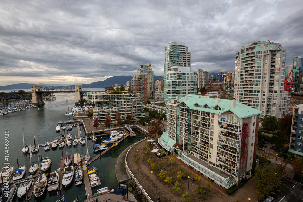 Downtown Vancouver, BC, Canada – October 07 2016 – Beautiful aerial view of False Creek, Granville Island, and Burrard Bridge.
