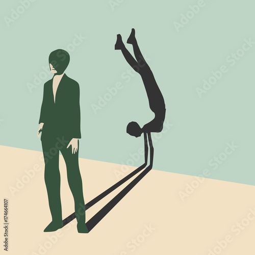 Young lady casting shadow of woman doing handstand