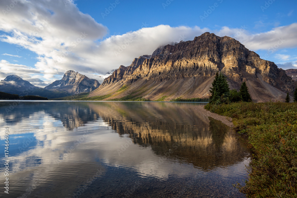 Beautiful landscape view of Bow Lake in Banff National Park, Alberta, Canada. Taken during a cloudy summer morning.