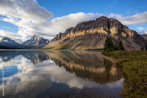 Beautiful landscape view of Bow Lake in Banff National Park, Alberta, Canada. Taken during a cloudy summer morning. © edb3_16