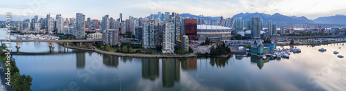 Panoramic City Skyline View of Downtown Vancouver around False Creek area from an Aerial Perspective. Taken in British Columbia  Canada  durin a colorful sunrise.