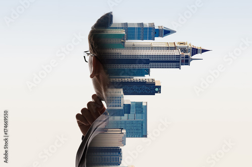 Digital Composite Of City And Businessman Portrait