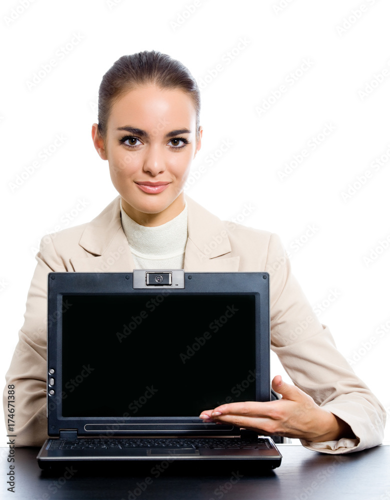Businesswoman showing laptop with copyspace, on white Businesswoman showing laptop with copyspace, on white
