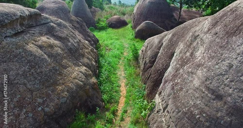 a narrow way in natural stone sculpture photo