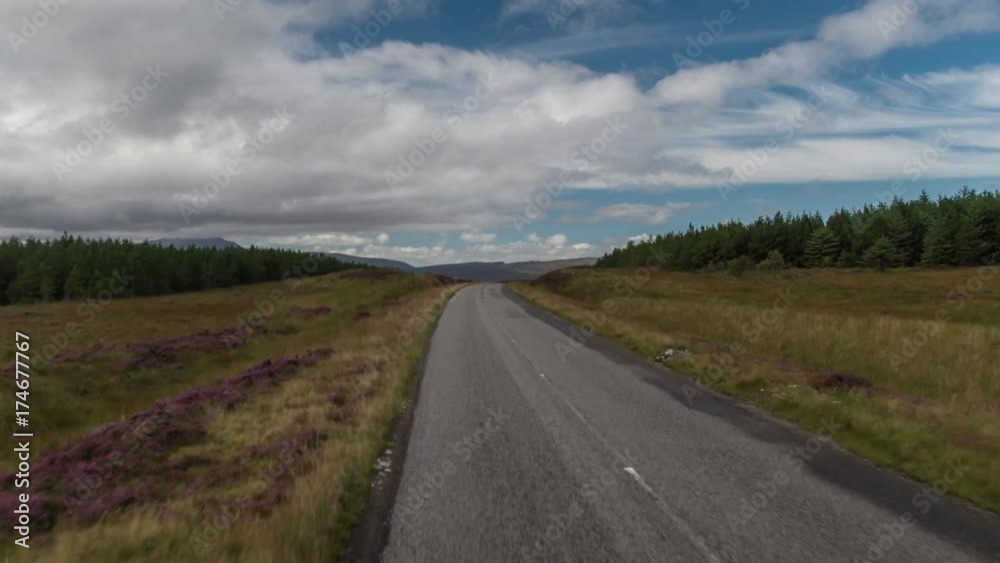 fast motion hyperlapse POV shot from a camera attached to the front of a vehicle driving through beautiful empty roads in the scottish highlands fast motion hyperlapse POV shot from a camera attached to the front of a vehicle driving through beautiful empty roads in the scottish highlands