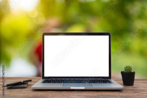 Computer Laptop and tablet computer  on the table blur background with bokeh, business technology concept